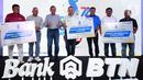 Pada acara BTN Tournament Golf 2022 Bank BTN memberikan bantuan Tanggung Jawab Sosial dan Lingkungan (TJSL) kepada para pengembang berupa 7.200 bibit pohon yang dibagi pro rata kepada REI, Apersi dan Himpera masing-masing 2.400 bibit pohon untuk mendukung program perumahan ramah lingkungan yang menjadi fokus BTN. (Liputan6.com/HO/BTN)