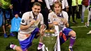 Luka Modric dan Mateo Kovacic. Keduanya bersama Real Madrid berhasil mengalahkan Juventus 4-1 dalam partai final Liga Champions 2016/2017 di Millennium Stadium, Cardiff, 3 Juni 2017. (AFP/Javier Soriano)