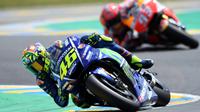 Pebalap Movistar Yamaha, Valentino Rossi. (AFP/JEAN-FRANCOIS MONIER)