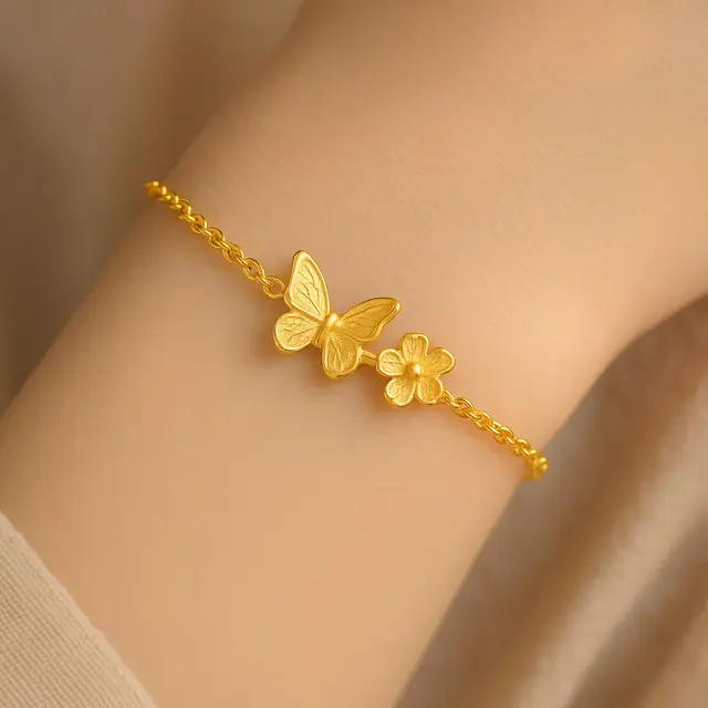 Model Gelang Emas Elegan 2 Gram Motif Bunga dan Kupu Trendi