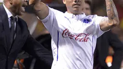 Arnold Peralta saat memperkuat CD Olimpia pada Liga Champions Concacaf di stadion Eladio Rosabal Cordero 5 Maret 2015. Pemain yang pernah memperkuat klub Rangers tewas ditembak disekitar Mal Uniplaza Honduras. (AFP PHOTO/Ezequiel BECERRA)