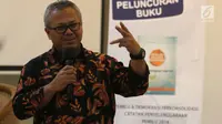 Ketua KPU Arief Budiman memberikan paparan dalam peluncuran buku di Media Center KPU RI, Jakarta, Rabu (13/12). KPU RI meluncurkan Buku dengan judul "Pemilu dan Demokrasi Terkonsolidasi, Catatan Penyelenggaraan Pemilu 2014." (Liputan6.com/Angga Yuniar)