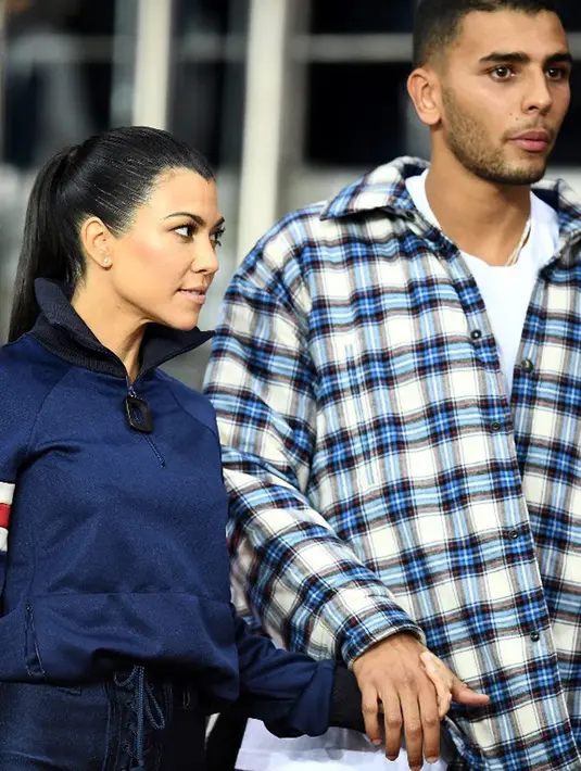 Seperti yang diketahui, Kourtney memang memiliki banyak saudara dan hal itu sangat disukainya. Maka dari itu, ia juga ingin hal serupa terjadi pada ketiga anaknya, Penelpoe, 5, Mason, 7, and Reign, 2. (AFP/Franck Fife)