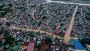 Foto udara menunjukkan rumah-rumah warga yang terendam banjir akibat Topan Vamco di Manila, Filipina (12/11/2020). Pemerintah Filipina pada Jumat (13/11) mengungkapkan Topan Vamco, yang memicu banjir besar dan tanah longsor menelan sedikitnya 14 korban jiwa. (Xinhua/Istana Kepresidenan Filipina)
