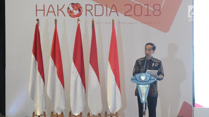 Presiden Joko Widodo (Jokowi) memberikan sambutan saat membuka Konferensi Nasional Pemberantasan Korupsi sekaligus Peringatan Hari Anti Korupsi Sedunia (Hakordia) 2018 di Jakarta, Selasa (4/12). Kegiatan ini diadakan oleh KPK. (Liputan6.com/Angga Yuniar)