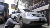 Operasi Berantas Parkir Liar di DKI, Sanksi Cabut Pentil hingga Derek Paksa