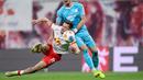 Gol RB Leipzig unggul empat gol pada babak pertama. Brajan Gruda dan Christoph Baumgartner masing-masing berhasil mencetak brace. (AFP/Ronny Hartmann)