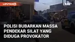 Polisi bubarkan massa pendekar silat yang kejar pemuda diduga provokator ke minimarket. Rekaman CCTV tunjukkan pemuda bersembunyi di dalam minimarket saat kejadian