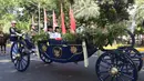 Suasana prosesi Kirab Bendera Pusaka dan Teks Proklamasi dari kawasan Monumen nasional (Monas), Jakarta, Minggu (17/8/2025). (KapanLagi.com/Budy Santoso)