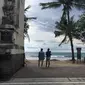 Potret Jumat, 1 Januari 2021 di Pantai Kuta, Bali, yang biasanya dipadati pelancong sepanjang tahun, kini tampak sepi karena dampak pandemi corona Covid-19. (Liputan6.com/Putu Elmira)