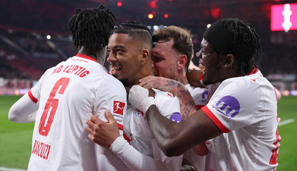 Sementara gol penutup dilesatkan oleh Benjamin Henrichs pada menit ke-78. (AFP/Ronny Hartmann)