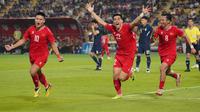 Timnas Vietnam&nbsp;meraih kemenangan 3-2 atas Thailand pada laga leg kedua final&nbsp;Piala AFF 2024, Minggu (5/1/2024) malam WIB. Hasil itu membuat Vietnam menjadi kampiun Piala AFF edisi ke-15, dengan keunggulan agregat 5-3. (AFP/Watsamon Tri-yasakda)