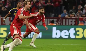 Selebrasi Harry Kane saat Munchen melawan Arsenal di Liga Champions (AFP)