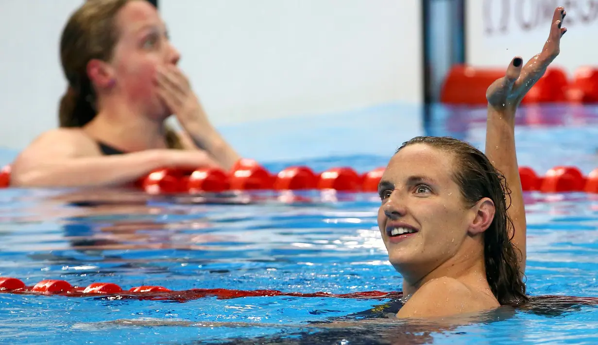 Atlet renang Hungaria, Katinka Hosszú merayakan kemenangannya usai menyelesaikan perlombaan renang 400m gaya bebas pada Olimpiade 2016 di Stadium Aquatics, Brasil, (6/8). (REUTERS/David Gray)
