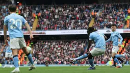 Kemenangan The Cityzens dibuka dengan gol indah Jeremy Doku pada menit ke-60. (AFP/Darren Staples)