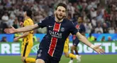 Pemain PSG, Khvicha Kvaratskhelia melakukan selebrasi setelah mencetak gol keempat timnya ke gawang Inter Milan dalam laga final Liga Champions 2024/2025 di Allianz Arena, Munchen, Jerman, Minggu (01/06/2025) dini hari WIB. (AFP/Franck Fife)