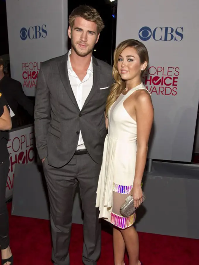 Liam Hemsworth dan Miley Cyrus makin mesra setiap harinya. (Foto: AFP)