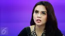 Model Anggita Sari ketika syuting program live streaming Liputan6.com di SCTV Tower, Jakarta, Kamis (7/1). Sebelumnya, beberapa waktu lalu Anggita sempat diamankan di sebuah hotel di Surabaya terkait kasus prostitusi online. (Liputan6.com/Gempur M Surya)
