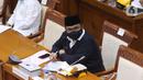 Menteri Agama Yaqut Cholil Qoumas saat mengikuti rapat kerja dengan Komisi VII DPR di Kompleks Parlemen, Senayan, Jakarta, Senin (15/3/2021). Rapat kerja tersebut membahas persiapan penyelenggaraan ibadah haji 1442 H/2021 M dan vaksinasi jemaah haji. (Liputan6.com/Angga Yuniar)