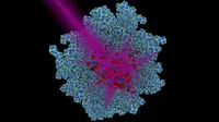 Ketika lampu UV dipakai untuk memanaskan kubus nano tersebut, reaksi-reaksi menghasilkan lebih banyak metan. (Sumber Chad Scales/Duke University)