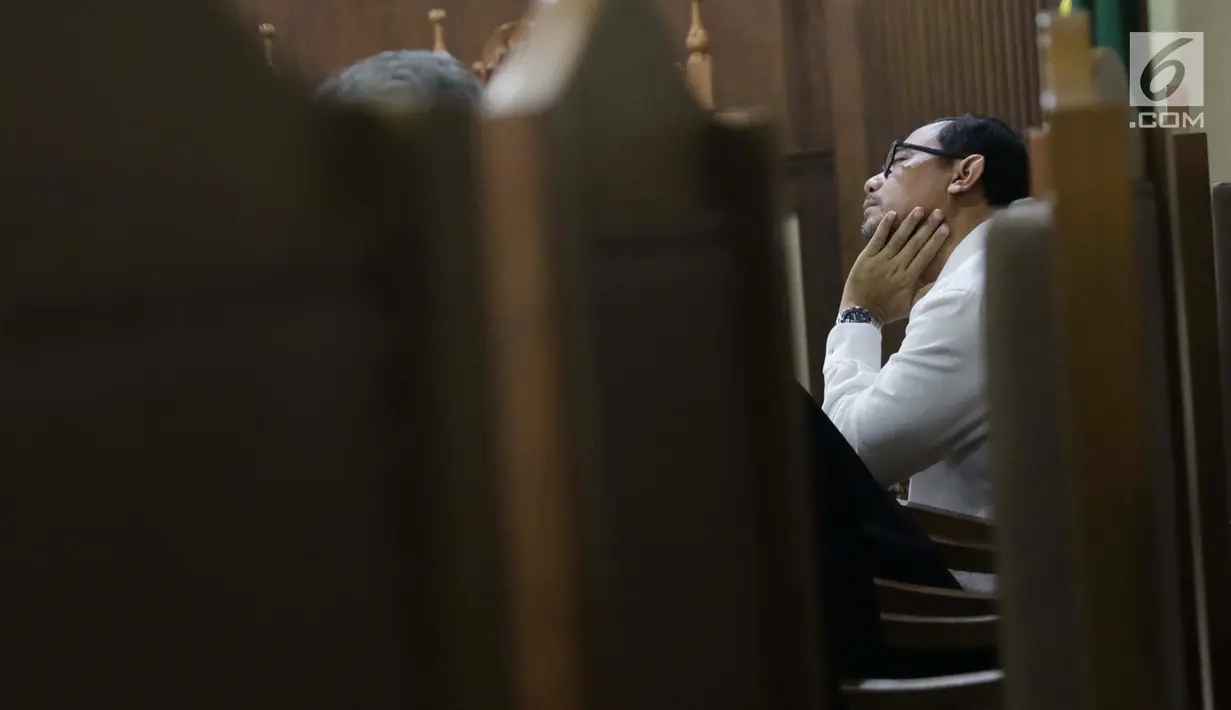 Mantan Kepala Kantor Wilayah Kemenag Provinsi Jawa Timur Haris Hasanuddin saat menjalani sidang lanjutan dalam kasus suap seleksi pengisian jabatan pimpinan tinggi Kementerian Agama, di Pengadilan Tipikor, Jakarta, Rabu (19/6/2019). (Liputan6.com/Helmi Fithriansyah)