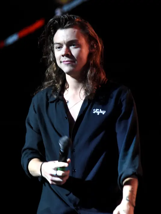 Hingga sat ini Harry belum menunjukan model rambut terbarunya, kemanapun dirinya pergi selalu memakai topi. (AFP/Bintang.com)