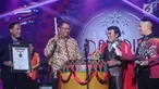 Menkominfo, Rudiantara meresmikan Liga Dangdut Indonesia pada Konser Raya 23 Tahun Indosiar di Jakarta Convention Centre, Kamis (11/1). Peserta Liga dangdut Indonesia berasal dari seluruh Indonesia mewakili 34 provinsi. (Liputan6.com/Helmi Fithriansyah)