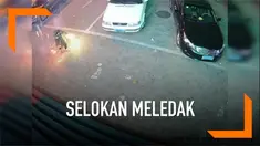 Insiden meledaknya selokan di Kota Chifeng, China. Ledakan terjadi karena seorang bocah memasukkan kembang api ke dalam selokan.