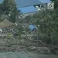 Pemandangan dari udara wilayah Kota Lampung usai diterjang tsunami, Selasa (25/12). Jumlah korban akibat Selat Sunda terus bertambah, hingga selasa (25/12) siang data dari Kapusdatin Humas BNPB 429 orang meninggal. (Liputan6.com/Zulfikar Abubakar)