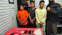 Ketiga pelaku diringkus tindak pidana penyalahgunaan obat terlarang. (Polres Paser/Liputan6.com)
