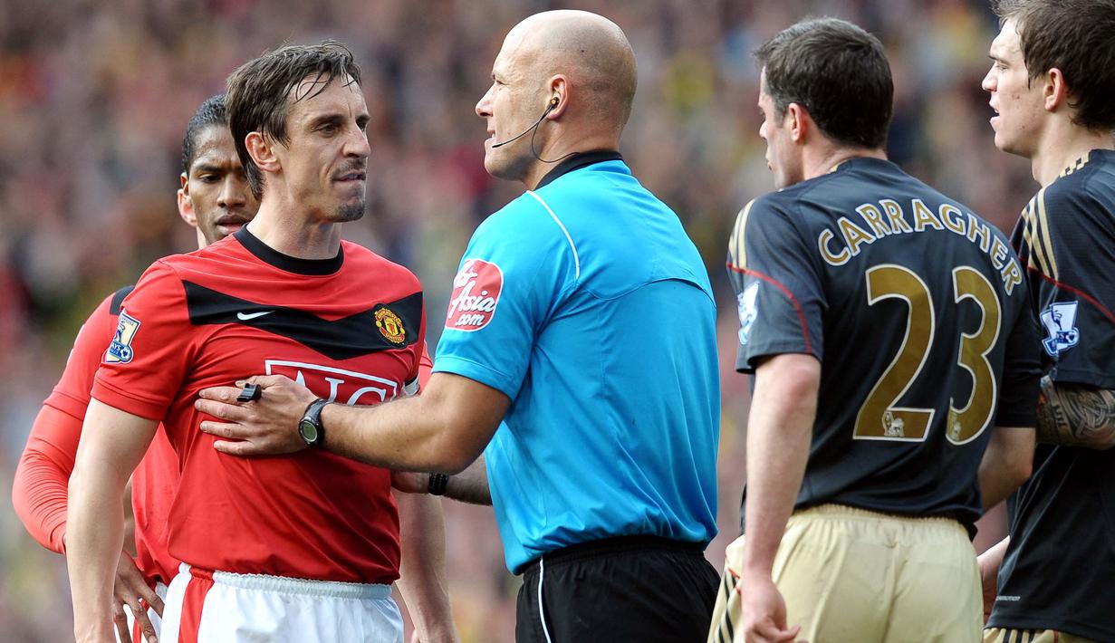Gary Neville dikenal sebagai salah satu bek kanan terbaik yang pernah dimiliki oleh Manchester United. Dirinya dipercaya oleh Sir Alex Ferguson menggantikan Roy Keane untuk mengemban sebagai kapten dari 2005 hingga 2011. (Foto: AFP/Paul Ellis)