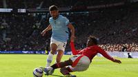 Duel sengit Manchester United vs Manchester City di Liga Inggris 2024/2025 (AFP)