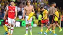 Reaksi bek Arsenal David Luiz setelah wasit meniupkan peluit tanda berhenti pada pekan kelima Liga Inggris 2019-2020 melawan Watford di Vicarage Road, Minggu (15/9/2019). Sempat unggul dua gol, Arsenal harus rela imbang 2-2 saat berjumpa tim tuan rumah Watford. (Ben STANSALL / AFP)