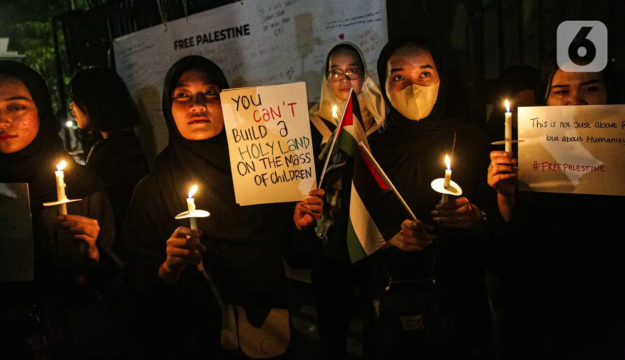 Ekspresi peserta saat mengikuti Aksi Damai Bela Palestina. (Liputan6.com/Faizal Fanani)
