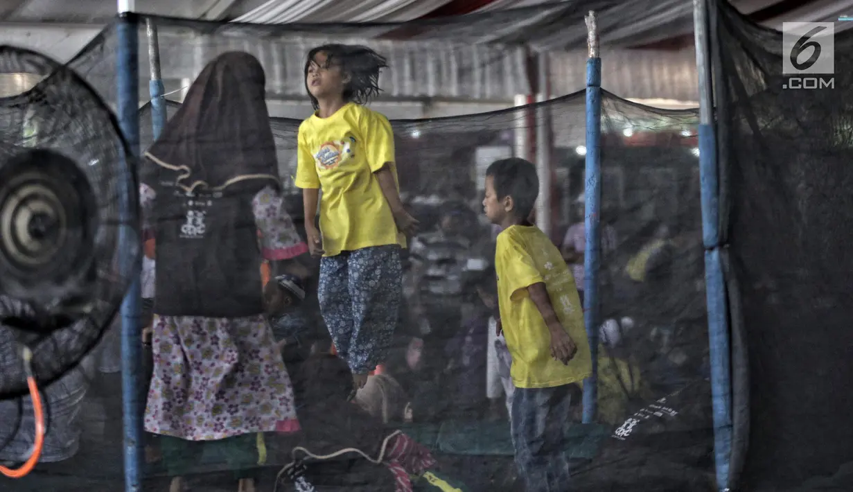 Anak-anak berprestasi bermain dalam kegiatan Gebyar Prestasi Keluarga Sejahtera di Buperta Cibubur, Jakarta, Minggu (12/8). (Liputan6.com/Faizal Fanani)