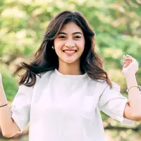 ilustrasi perempuan tertawa santai/Art_Photo/Shutterstock