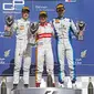 2.	Rio Haryanto berpose di podium bersama peringkat 2, Stoffel Vandoorne (kiri) dan peringkat 3, Nathanael Berthon. (photo by gp2series)