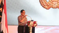Kapolri Jendral Tito Karnavian memberikan sambutan saat menghadiri hari jadi Polisi Wanita (Polwan) yang ke-69 di ruang aula Perguruan Tinggi Ilmu Kepolisian (PTIK), Jakarta, Senin (11/9). (Liputan6.com/Faizal Fanani)