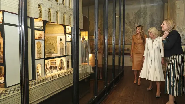 Adu Gaya Busana Kate Middleton Vs Melania Trump Saat Main Bareng Anak-anak Pramuka