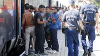 Ribuan Imigran Tiba di Jerman dengan Kereta Api (Reuters)