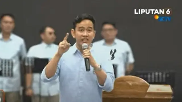 Gibran Rakabuming Raka saat memberikan pidato dalam acara deklarasi capres-cawapres Koalisi Indonesia Maju (KIM) di Indonesia Arena, Senayan, Jakarta. (YouTube @Liputan6)