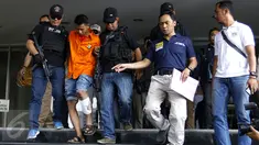 Tersangka Mursalim saat digelandang petugas Resmob Direktorat Reserse Kriminal Umum Polda Metro Jaya, Jakarta, Jumat (11/9/2015). Pelaku ditangkap dalam pelariannya seusai membunuh WN Jepang Nishimura. (Liputan6.com/Yoppy Renato)