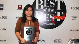 PT Elang Mahkota Tekhnologi Tbk, merupakan salah satu perusahaan yang mendapatkan predikat Trifecta‎ Award dari majalah Forbes Indonesia, Hotel Ritz Carlton, Mega Kuningan, Jakarta, Rabu (10/12/2014). (Liputan6.com/Herman Zakharia)