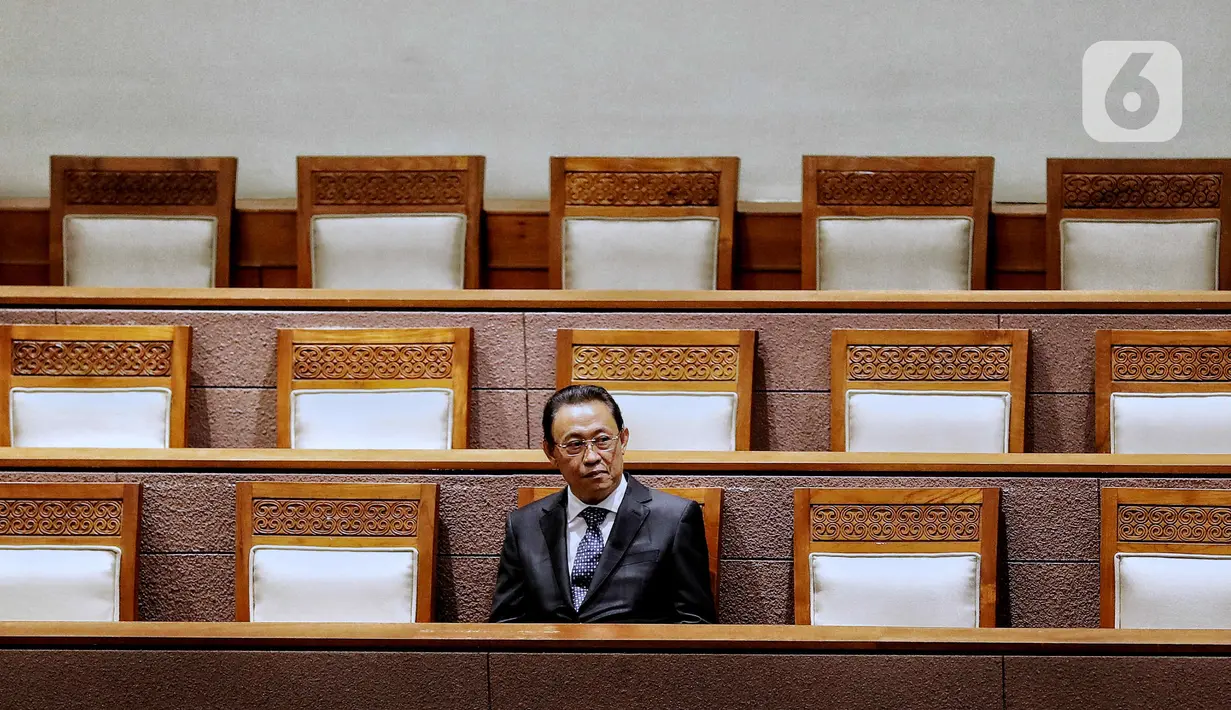 Calon Anggota BPK Periode 2022-2027 Ahmadi Noor Supit menghadiri rapat Paripurna DPR Ke-6 Masa Persidangan I Tahun Sidang 2022-2023 di Kompleks Parlemen, Senayan, Jakarta, Selasa (27/9/2022). Rapat paripurna tersebut membahas laporan Komisi XI DPR terhadap Hasil Uji Kepatutan (Fit and Proper Test) terhadap Calon Anggota BPK Periode 2022-2027 dan dilanjutkan dengan pengambilan keputusan serta penetapan pasangan kerja Komisi IV DPR dilanjutkan dengan pengambilan keputusan. (Liputan6.com/Angga Yuniar)