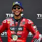 Enea Bastianini berhasil finis pertama dengan catatan waktu 19 menit 49,929 detik usai melahap 10 putaran lomba. (BENJAMIN CREMEL/AFP)