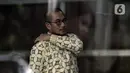 Komisioner KPU Pusat, Hasyim Asy'ari tiba untuk dimintai keterangan oleh penyidik di Gedung KPK, Jakarta, Jumat (24/1/2020). Hasyim diperiksa sebagai saksi untuk tersangka mantan Komisioner KPU, Wahyu Setiawan. (merdeka.com/Dwi Narwoko)