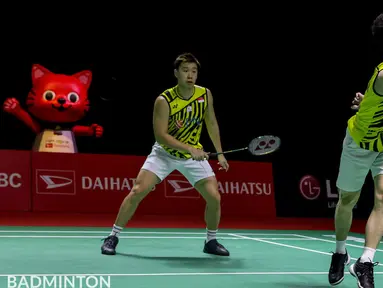 Ganda putra Indonesia, Kevin Sanjaya Sukamuljo/Marcus Fernaldi Gideon, berhasil meraih kemenangan dua gim langsung atas wakil Prancis, Lucas Corvee/Ronan Labar, pada babak kedua Indonesia Masters 2021. (Badminton Photo/Raphael Sachetat)