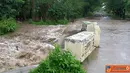 Citizen6, Kilo: Banjir di jalan Kore-Kiwu, Kecamatan Kilo, Kabupaten Dompu, Nusa Tenggara, telah meluap sampai kebadan ruas jalan. (Pengirim: Aji)