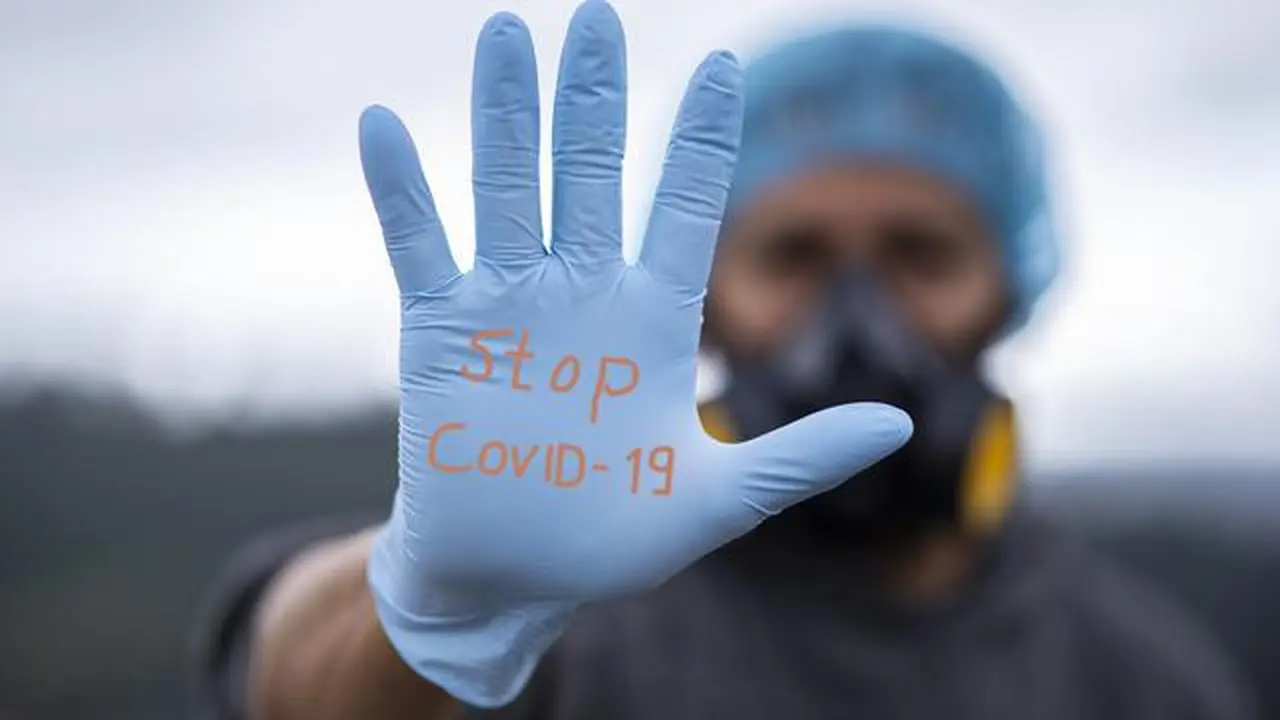 Ilustrasi Stop Covid-19 (Liputan6.com/Arfandi Ibrahim)