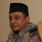 Ketum GNPF-Ulama, Yusuf Muhammad Martak (kiri) dan Anggota GNPF ustad Edy Mulyana memberikan keterangan menepis isu kepemilikan saham Lapindo di Jakarta, Senin (24/9). (Merdeka.com/Dwi Narwoko)